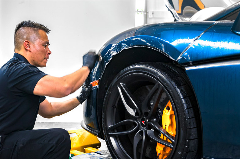 XPEL pre-cut Paint Protection Film kit being installed
