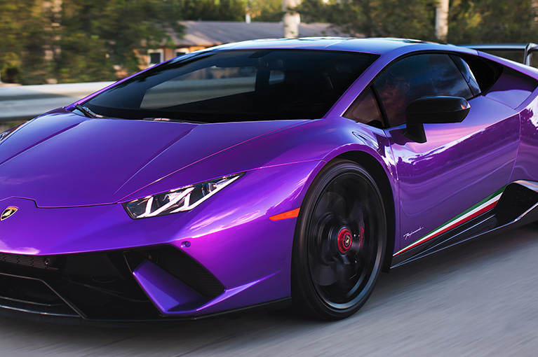 XPEL PRIME XR PLUS Automotive Window Tint on a purple Lamborghini
